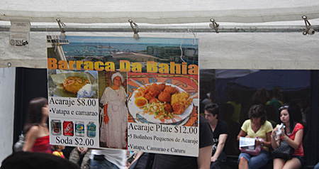day2-21 Acarajé no prato por 12 dólares? Aceita vale-transporte?