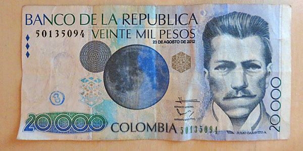 Que moeda eu levo para a Colômbia real peso dólar
