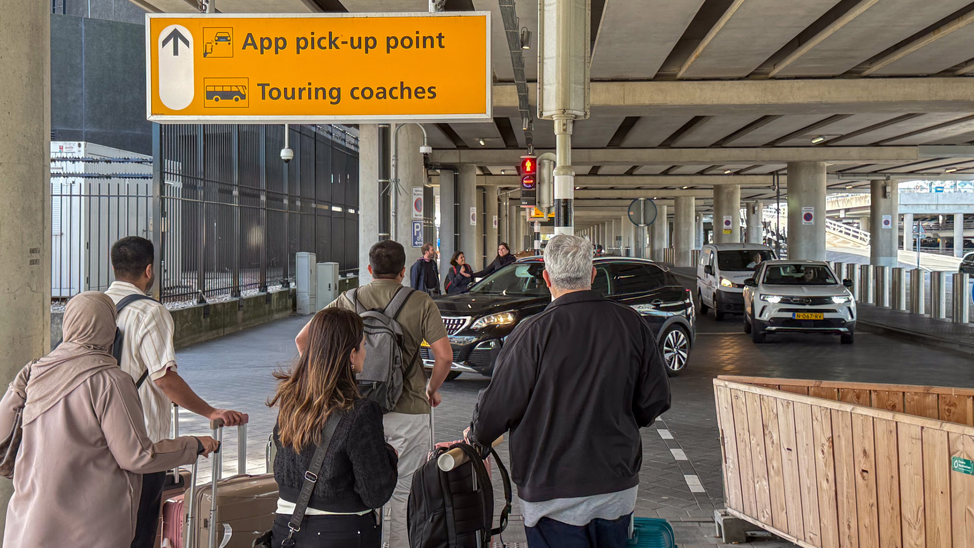 Como chegar a Amsterdã: transporte do aeroporto ao hotel 4 Como chegar a Amsterdã: ponto de Uber no aeroporto Schiphol
